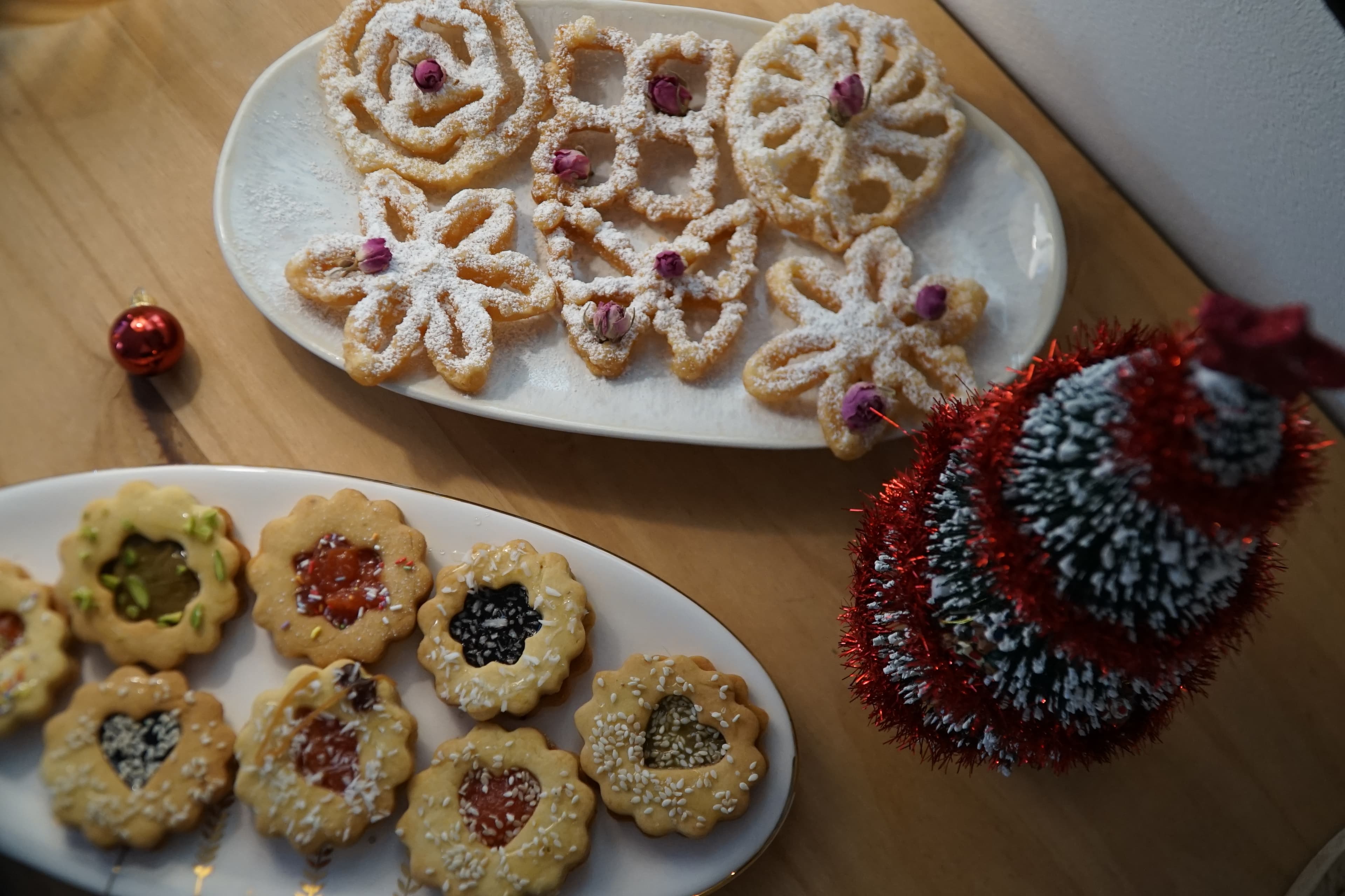 A lavish spread of various Persian sweets on a decorated table.